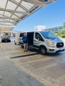 BayRunner driver standing outside of BWI